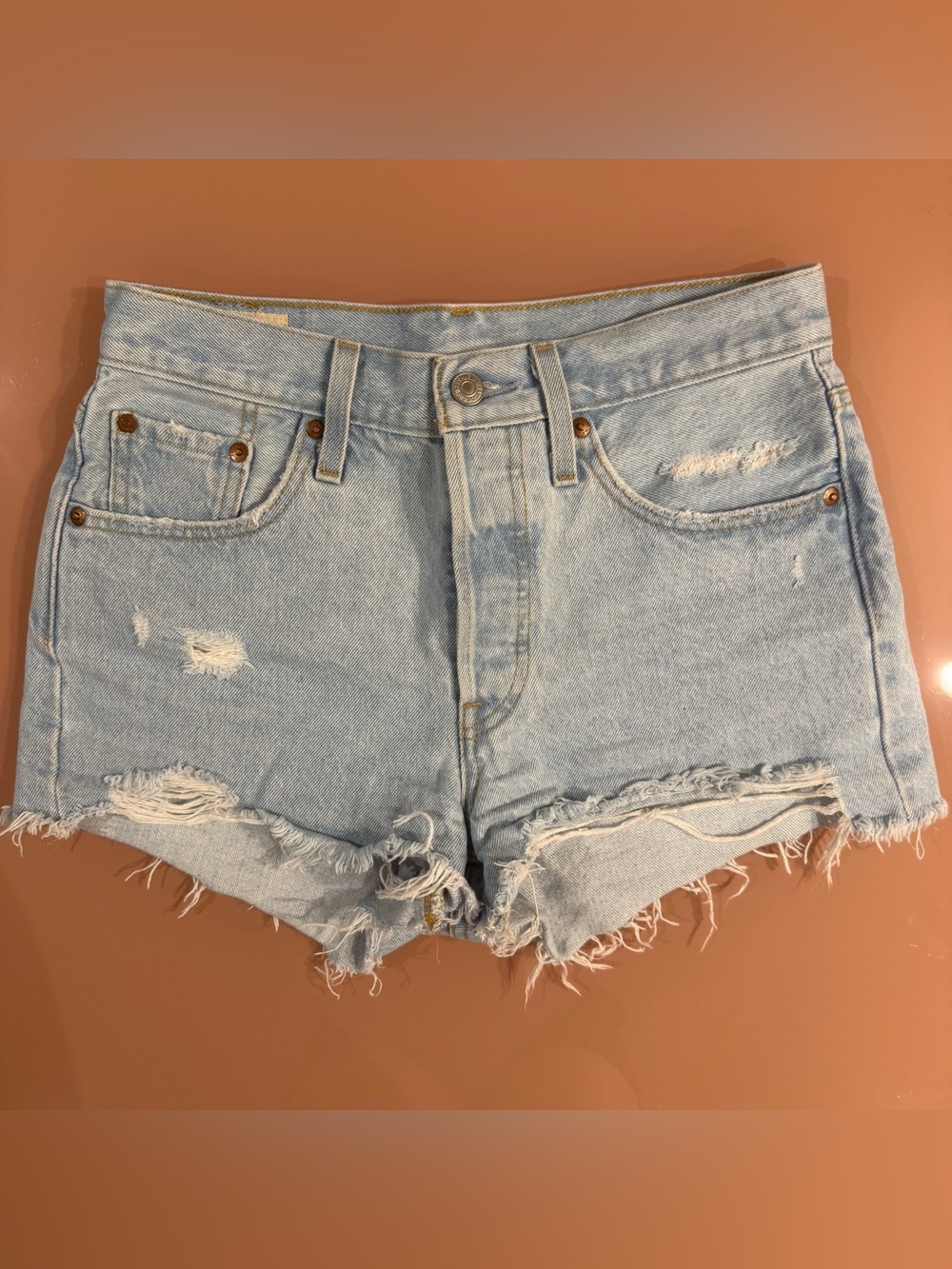 Levi’s Light Wash Distressed Denim Shorts